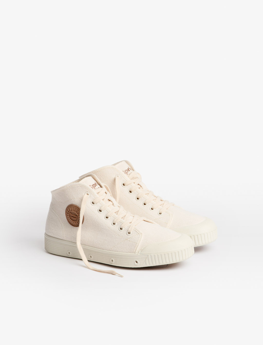 Spring Court B2 off-white cotton sneakers – three-quarter worn view