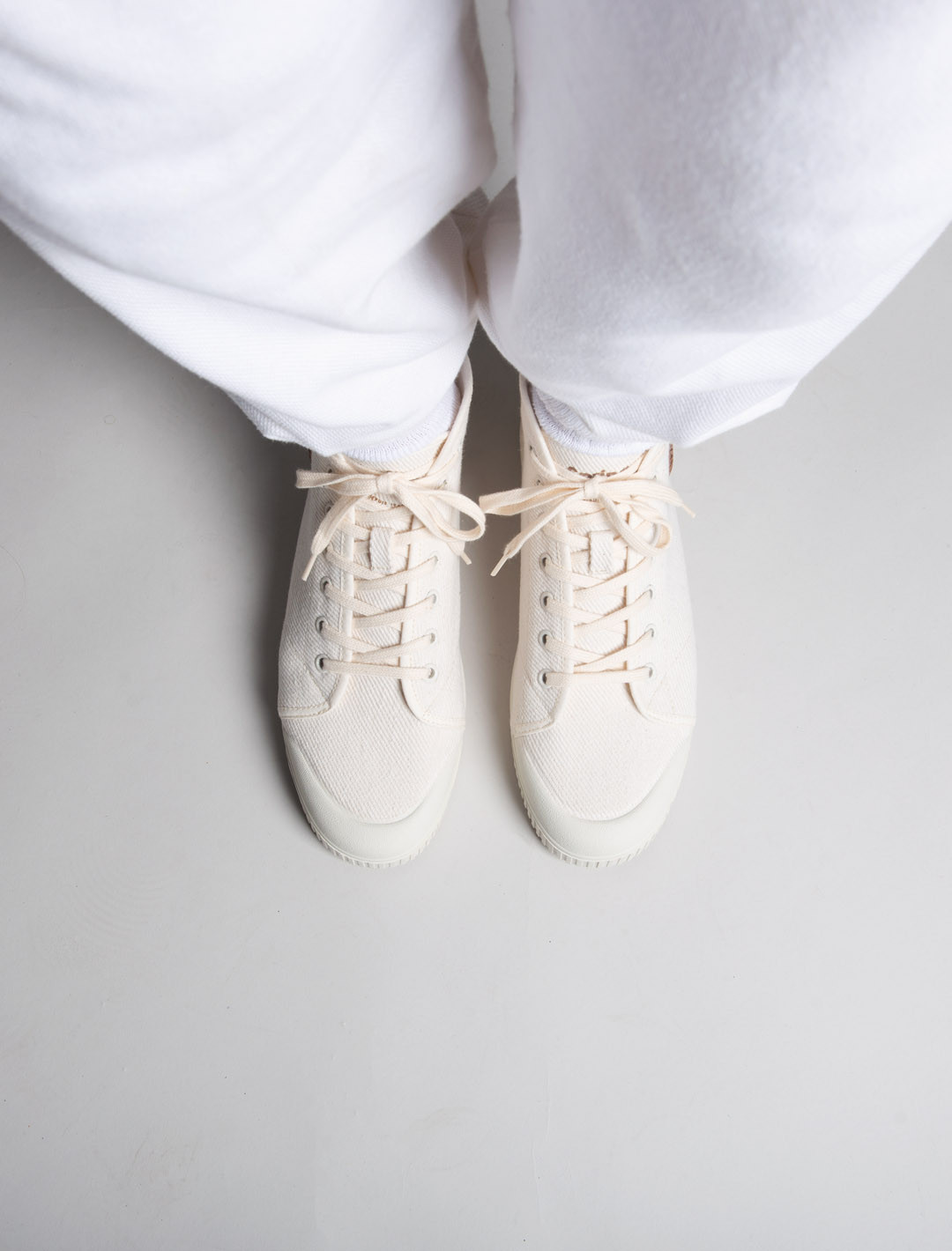 Spring Court B2 off-white cotton sneakers – top worn view